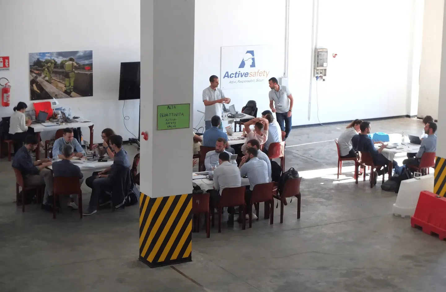 Participants working in small groups at the Active Safety workshop
