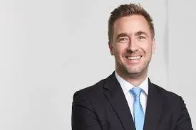 Portrait of a smiling man in a suit and tie
