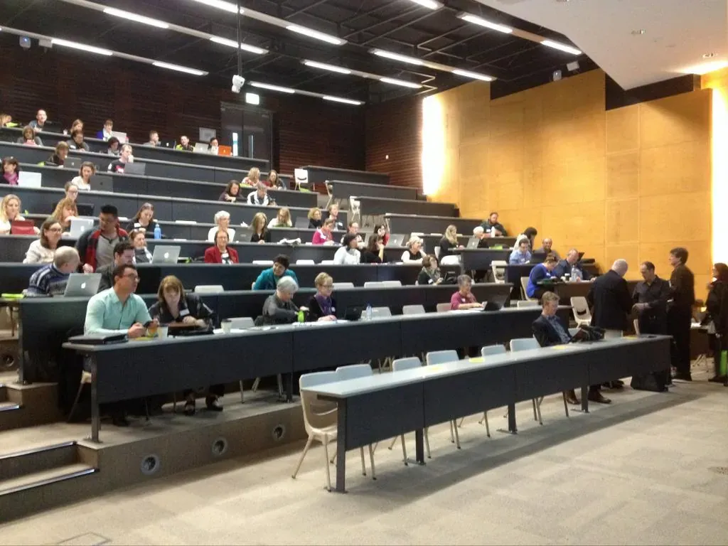 Attendees seated in a lecture theatre at an industry forum