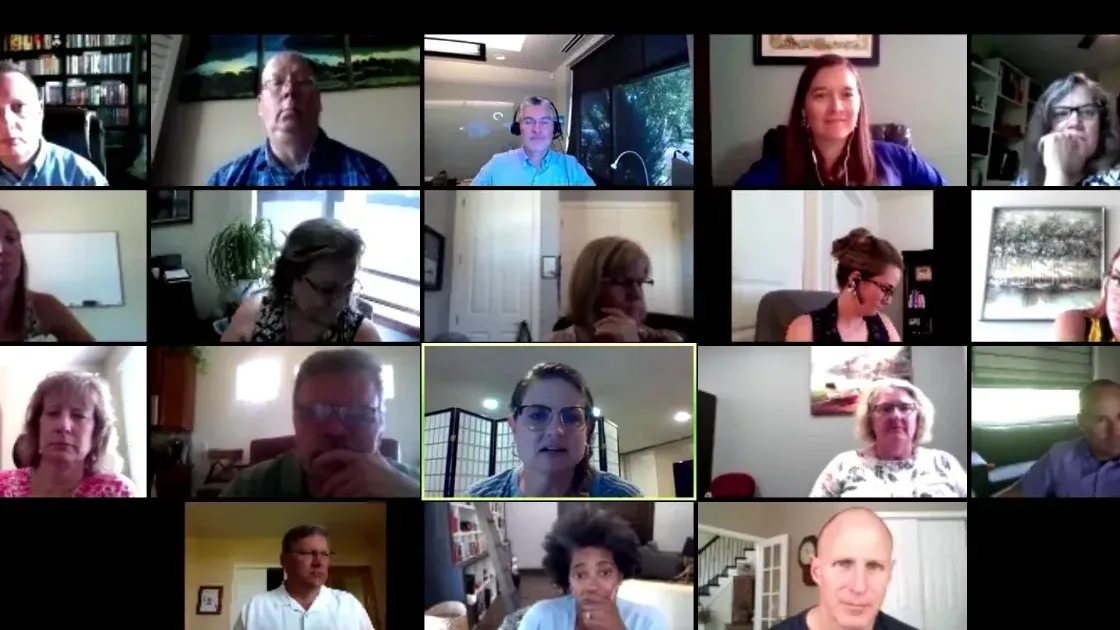 A grid of remote teammates on a video call, each joining from their own home office