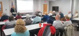 Presenter addressing seated attendees at a Rockville Science Center session
